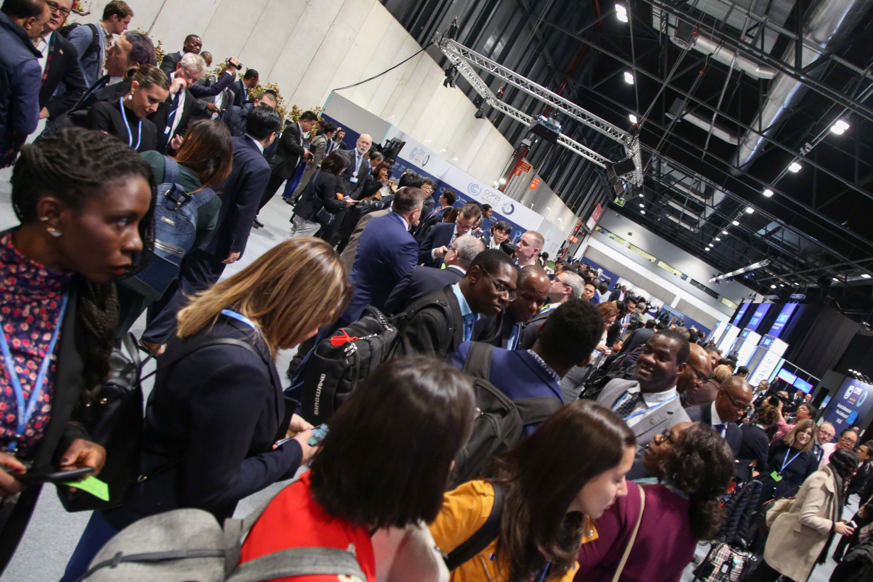 Delegates gather outside plenary before the start of the high-level segment.