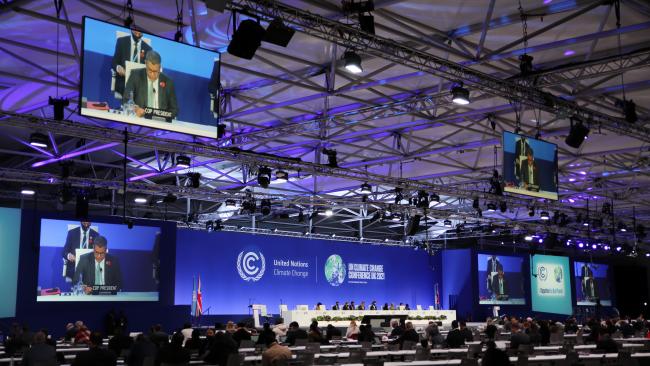 Delegates gather in plenary for the opening of COP 26.