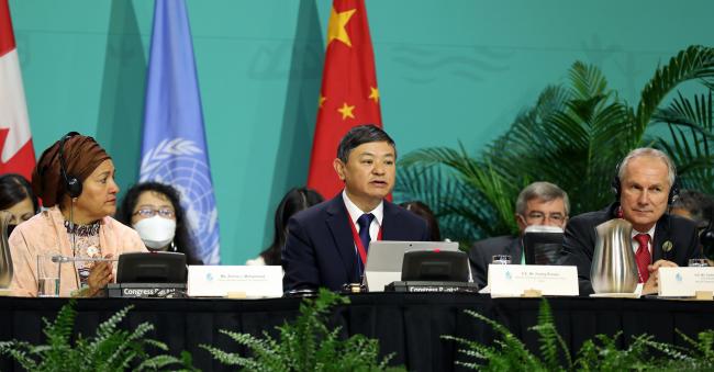 From L-R: Amina J. Mohammed, UN Deputy Secretary-General; COP 15 President Huang Runqiu, Minister of Ecology and Environment, China; and Csaba Kőrösi, President of the 77th session of the UN General Assembly 