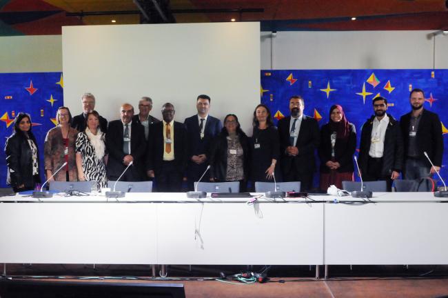 Group photo of panelists and participants