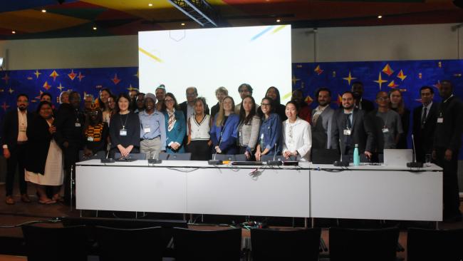 A group photo following the end of the Intergenerational Dialogue