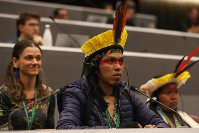 Representatives of the Yawanawá People, from the Gregório River Indigenous Land, Brazil, attend the afternoon plenary