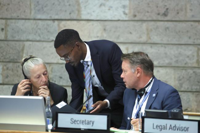 OEWG Chair Gudi Alkemade consults with the Legal Advisor and the Secretariat 