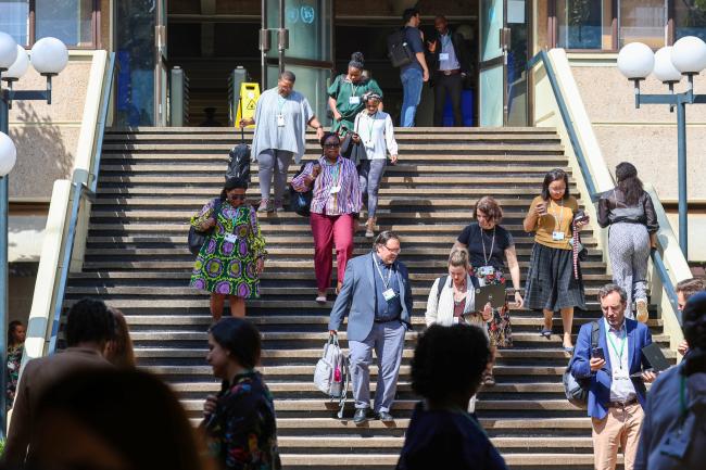 Delegates arriving before the morning plenary