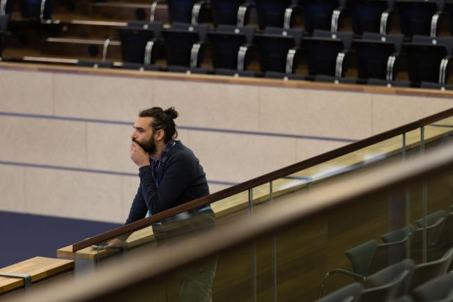 Delegates watch the proceedings from the gallery