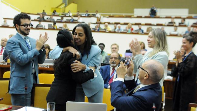 Leticia Reis de Carvalho, Brazil, celebrates with the Brazilian delegation