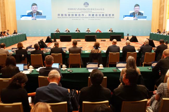 A view of the dais during the opening remarks by Chair Huang Runqiu, CCICED Chinese Executive Vice Chairperson and Minister of Ecology and Environment